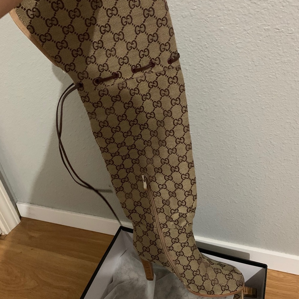Designer thigh high boots